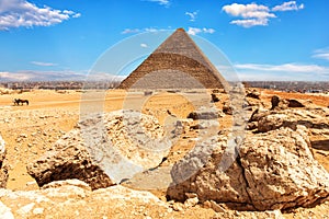 The Pyramid of Cheops and stones in the desert of Giza, Egypt