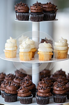 A pyramid of cupcakes on a platter