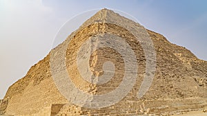 The Pyramid of Djoser or Djeser and Zoser, or Step Pyramid is an archaeological remain in the Saqqara necropolis, Egypt, northwest photo