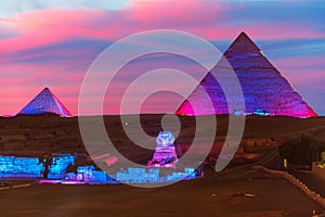 The Pyramid of Egypt and the great Sphinx night view in the lights, Giza