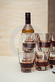 Pyramid of glasses of alcohol made in a pyramid for event party or wedding ceremony