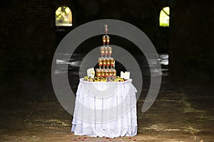 Pyramid of glasses with sparkling wine