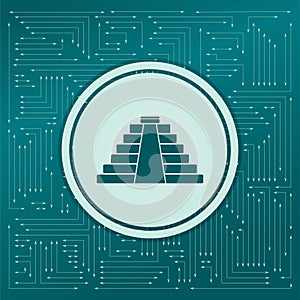 Pyramid icon on a green background, with arrows in different directions. It appears on the electronic board.