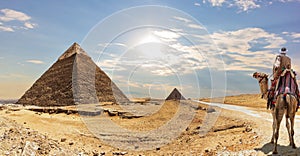 The Pyramid of Khafre and a bedouin on a camel, Giza, Egypt