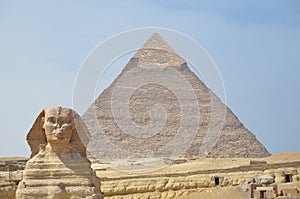 The pyramid of Khafre or of Chephren with a statue of a sphinx in the foreground