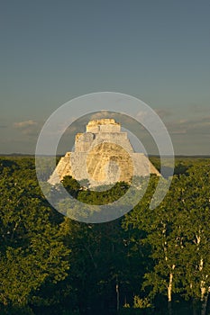 Pyramid of the Magician, Mayan ruin and Pyramid of Uxmal in the Yucatan Peninsula, Mexico at sunset