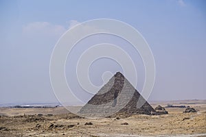 Pyramid of Menkaure Mycerinus with granite stones, Giza desert,