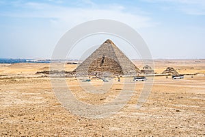 Pyramid of Menkaure. Pyramid of Menkaure and Pyramids of Queens, Cairo, Giza. Egyptian desert in Giza. Vacation holidays