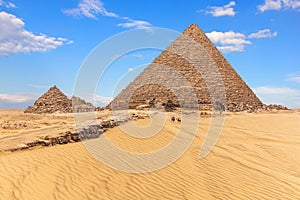 The Pyramid of Menkaure and the Pyramids of the Queens, sunny day view, Egypt