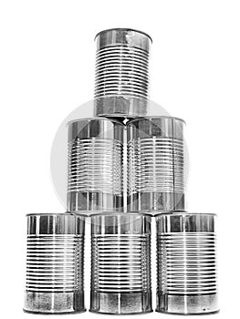 Pyramid of metal cans on white photo