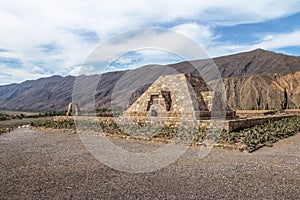 Pyramid Monument to the archaeologists at Pucara de Tilcara old pre-inca ruins - Tilcara, Jujuy, Argentina photo