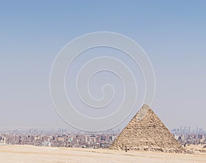 Pyramid over the panorama of Cairo