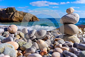 Pyramid of sea pebbles on the Black Sea coast