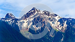 The pyramid shaped rugged top of Cheam Mountain, or Cheam Peak, that towers over the Fraser Valley of British Columbia