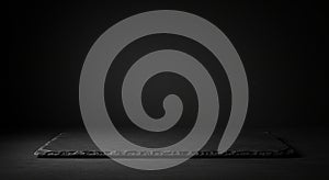 A pyramid-shaped tent with a modern design features angular blue geometric patterns