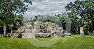 Pyramid and Stella in Great Plaza of Mayan Ruins - Copan Archaeological Site, Honduras