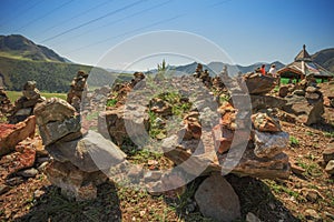 Pyramid of stones on a background of mountains