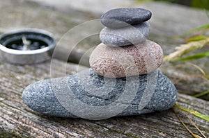 Pyramid of stones with pebbles from the beach