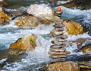Pyramid of stones on river