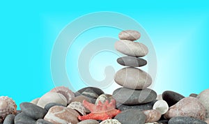 The pyramid of stones with sea shells