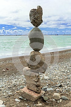 pyramid of stones on the sea shore