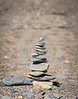Pyramid of stones on the seashore.