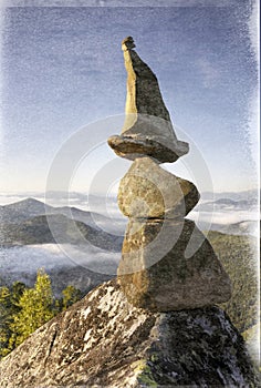 Pyramid of stones at the top is a landart