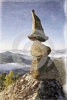Pyramid of stones at the top is a landart photo