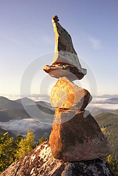 Pyramid of stones at the top is a landart photo