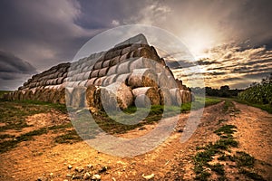 The pyramid of straw bales