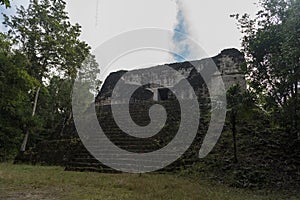 Pyramid and the Temple in Tikal Park. Sightseeing object in Guatemala with Mayan Temples and Ceremonial Ruins. Tikal is an ancient