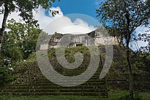 Pyramid and the Temple in Tikal Park. Sightseeing object in Guatemala with Mayan Temples and Ceremonial Ruins. Tikal is an ancient