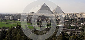 The Pyramids of Giza over Cairo - Egypt. photo