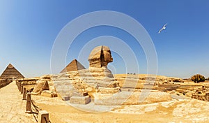 Pyramids of Giza panorama, view on the Sphinx, the Pyramid of Cheops and the Pyramid of Chephren