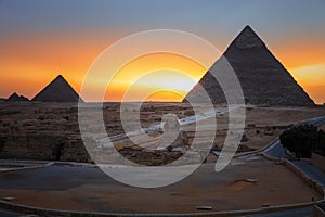 The Pyramids and the Sphinx in twilight, evening view of Giza complex, Egypt