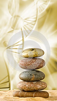 Pyramids of stones against the background of the dna chain are a symbol of calm and balance