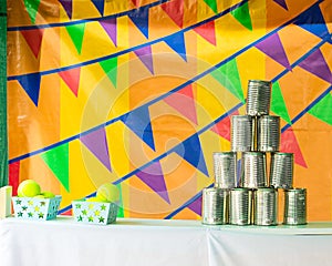 The pyramids of tin cans for throwing balls. photo
