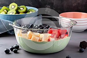 pyrex bowl filled with creamy, fruity smoothie