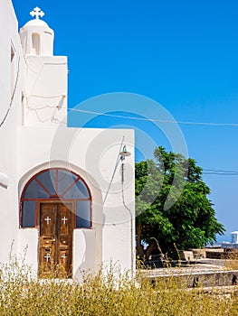 Pyrgos city view, Typical white santorini christian church. Santorini island view. Greece