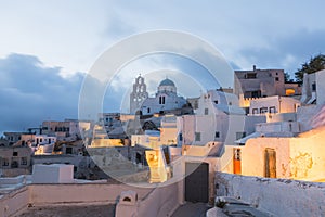 PYRGOS, GREECE - MAY 2018: View of orthodox church and bell tower in Pyrgos town center, Santorini island, Greece