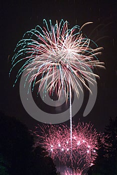 pyrotechnic show. fireworks in the night sky over the city.