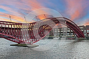 Python bridge in Amsterdam at sunset