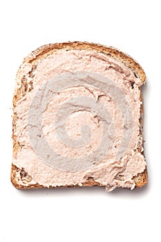 PÃÂ¢tÃÂ© spread on slice of bread photo