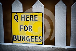 Q for bungees sign