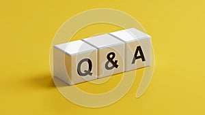 QA Question answer. The wooden cubes form the word QA Question answer. Business The concept of QA Question answer