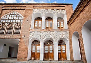 Qajar dinasty historical building Asef mansion with patterns and relief on the brick walls