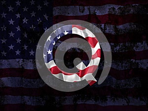 Qanon initial agaisnt a faded blue grunge flag background. Deep state conspiracy concept