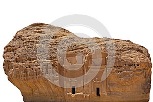 Qasr Al Farid, one of the tomb at the archaeological site Mada`in Saleh also called Al-Ã¡Â¸Â¤ijr or Hegr, Saudi Arabia. Isolated on w photo