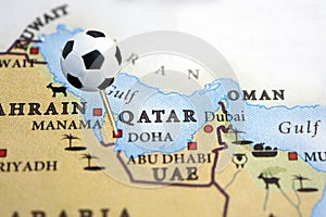 Qatar on a map with a soccer ball pin photo