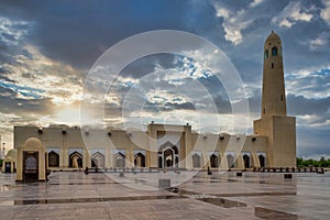 Qatar State Mosque Imam Muhammad ibn Abd al-Wahhab Mosque exterior view at sunset with clouds in the sky